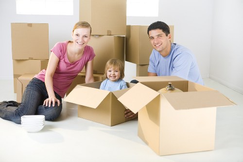 Professional office movers packing equipment